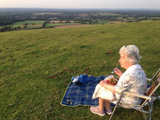 Mum having a picnic by Jack and Jill windmills on Clayton (with Jo taking the photo; July 2019)