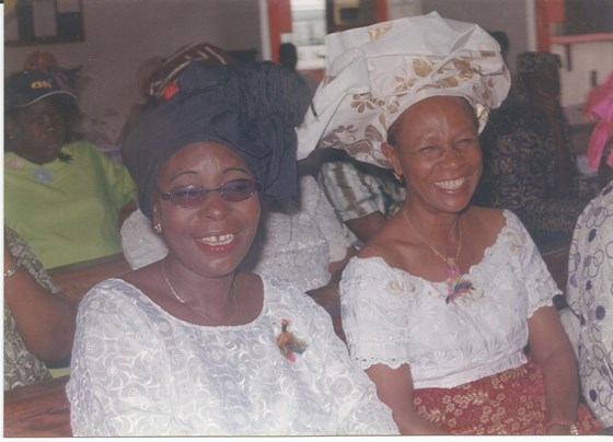 With friend Mrs Akintola