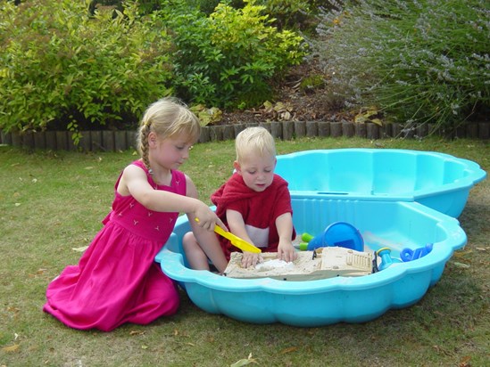 William and Ellena playing in the sandpit