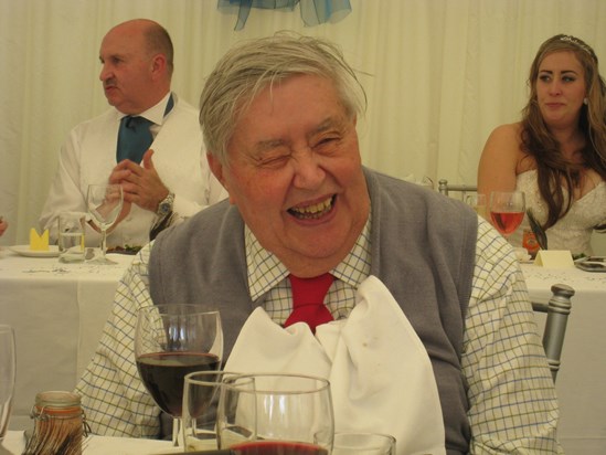 Dad laughing at Becky's wedding