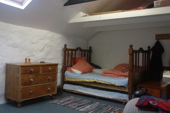 Bothy : main space, bedroom end. Renovated by Julian with the help of Diana and some friends.