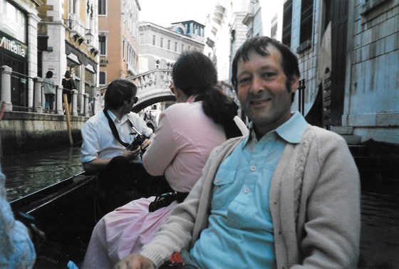 Enjoying a gondola trip in Venice.