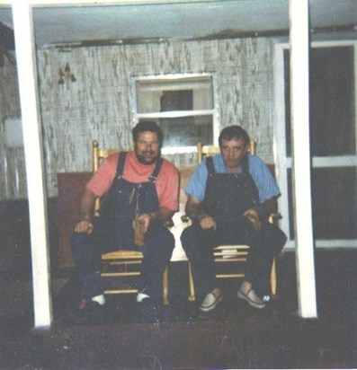 Jimmy Clay and Jimmy Smith doing a lil whittling in their overalls