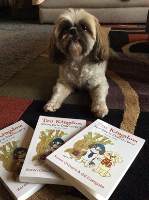 Queen Coffee treasuring her Tzu Kingdom books