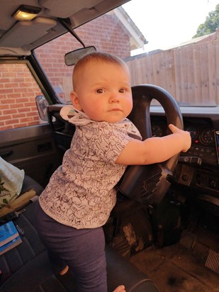 Lily in Grandads land rover 