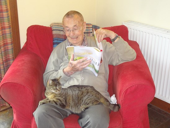 Fred in mellow mood with cat (Clio?) 2012, during Chris and Noel visit