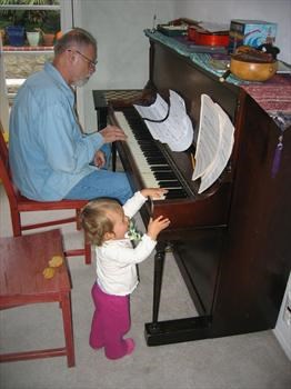 Grampa Corm playin' piano with Izzy.