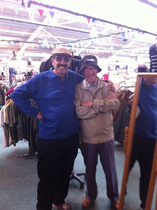 Bob and Allan trying hats on.