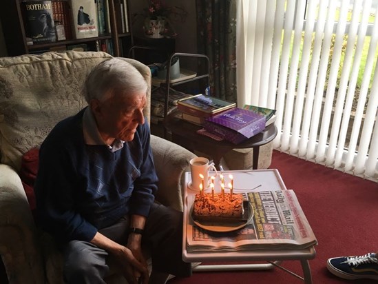 Grampy's 93rd Birthday-Blowing out cake candles