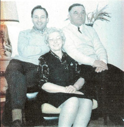 Alex as a young man with his Mum and Dad