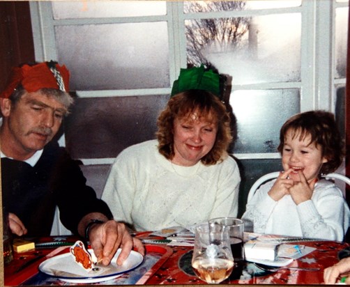 Den and Sandy with their goddaughter Rachel, Christmas 1987 - added by Pauline. 