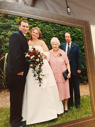 Steve and my wedding day 02/05/2008. With my God parents. 