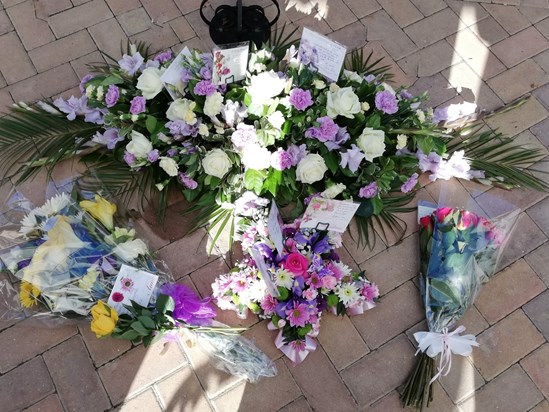 Floral tributes for Jean Robertson