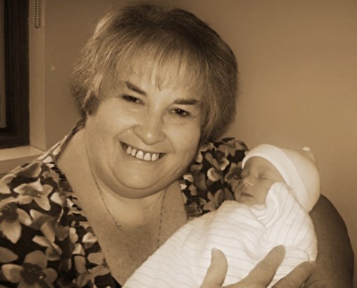 Mom holding Mason for the 1st time. July 27, 2012