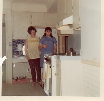 Eira with her Mom in their kitchen
