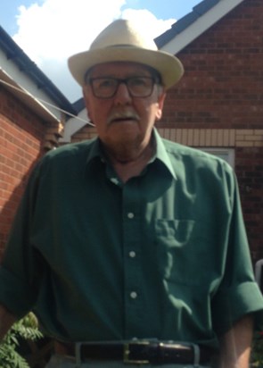 Dad in the garden sporting his Panama hat
