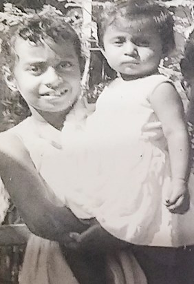 Prema carrying me when I was young!