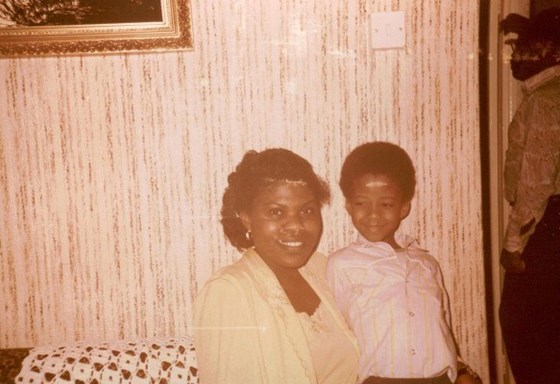 With his auntie as a child