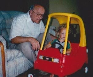 Grampa teaching David to drive