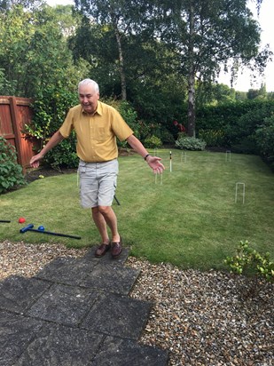 Dad ready to teach us croquet in his garden wearing his favourite shirt. August 2019.