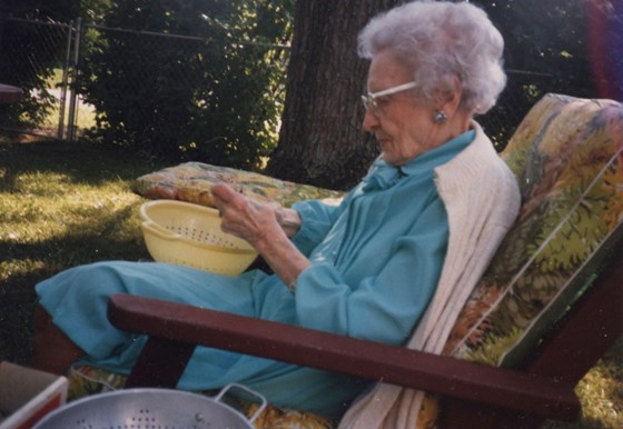 Mother snapping beans in 1987