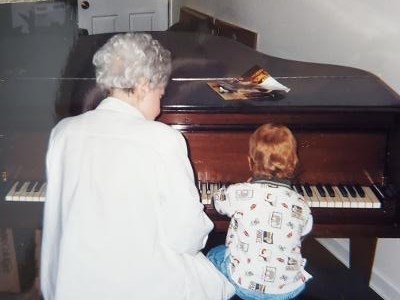 At the piano, 1999