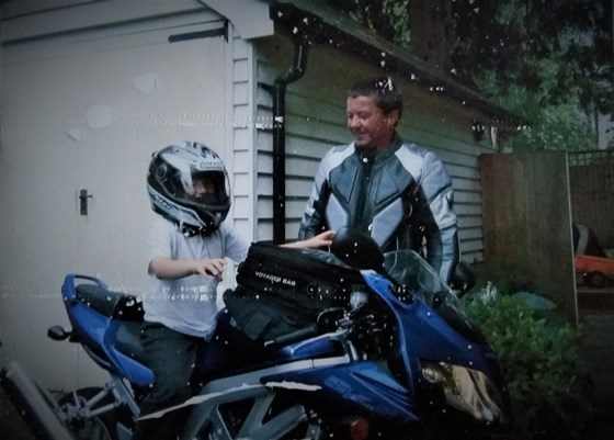 Steve shows nephew Duncan his new bike circa 2005
