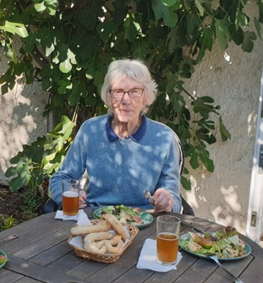 Mum enjoying a birthday lunch and beer at Helen's