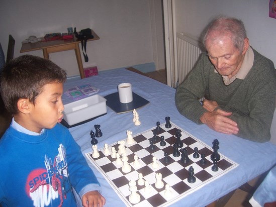 Syd playing chess with Daniel 2005