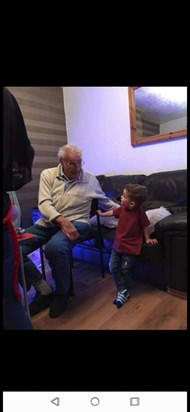 Great grandad and great Grandson, no doubt telling him a story about the navy x