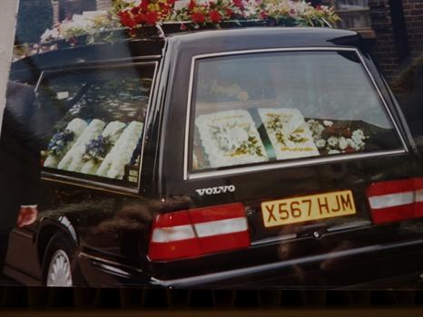 Olly's funeral car with flowers.