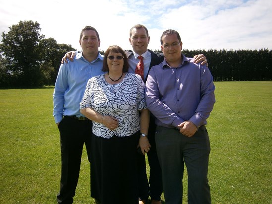 Me and our three boys at our granddaughter Amelia's christening