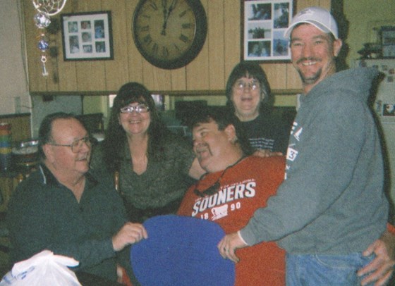 Glenn with Uncle Roy, Aunt Linda, Tim and Kim. December 2012