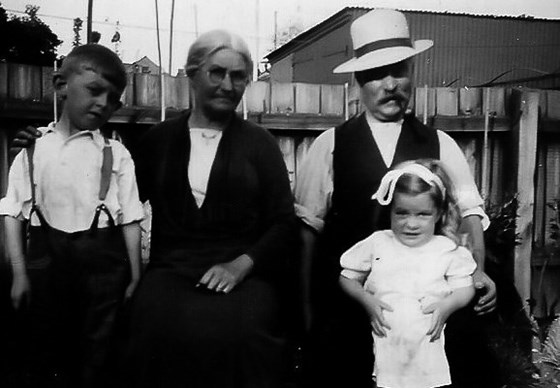 with brother Peter, Pop Fisher and Grandma Alice abt. 1938