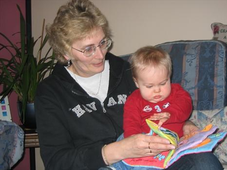 Ethan loved to sit on Nana's lap and have a story read to him.