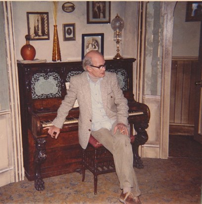 Paddy with piano, date unknown