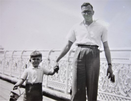 With his father by the sea