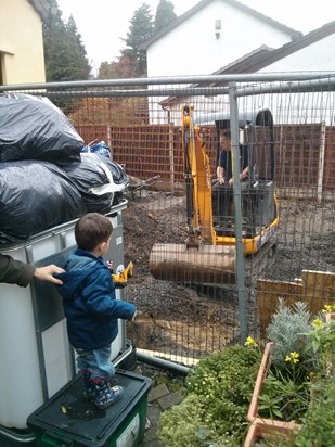 Watching Grandpa dig the garage foundations Nov 2014