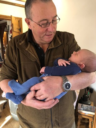 Grandpa with baby Roo on Christmas Eve 2019