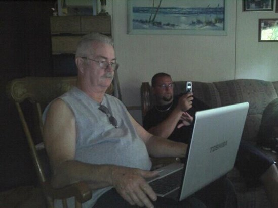 Dad and Scott enjoying technology