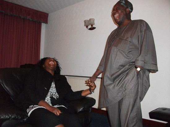 Foluke and her father in law sharing a joke