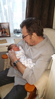 Roger with the new born Harry