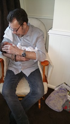 Roger with the new born Harry