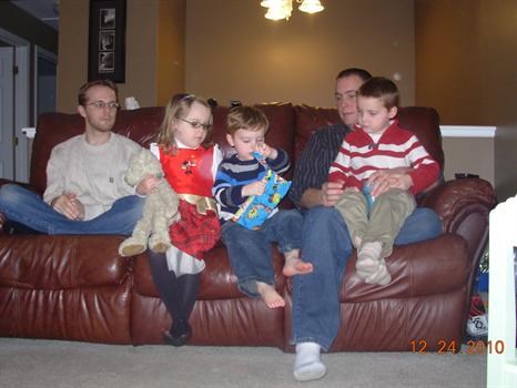 Christmas 2010 with his niece and nephews