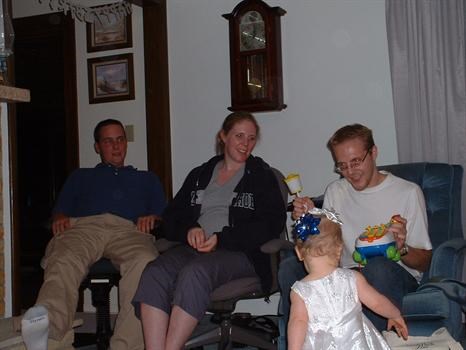 2006 - Matt & Tanya watch Sheldon having fun with Kat on her first birthday.