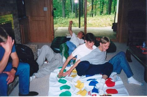 Sheldon playing Twister with friends
