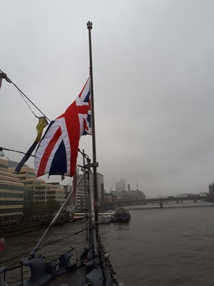 The Union Jack on HMS Belfast was lowered during dad's funeral.