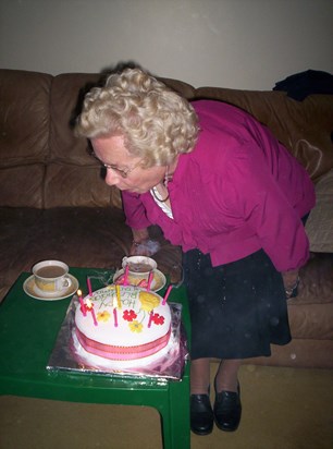 Happy Birthday mum. Here you are aged 81 blowing out the candles on the cake we made you xx