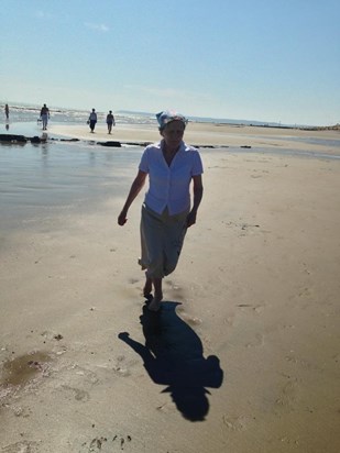 Mum loved the sea - she was so carefree this day, dancing in the sand - July 2013