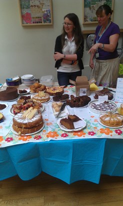 MNDA Cakestall & Raffle June 2012 - Heather and Alison setting out the cakes & Glider Flight Raffle!